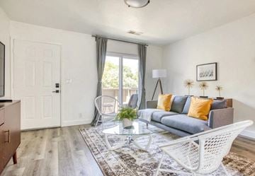 Sunnyvale apartment for rent - a living room with a couch and a table