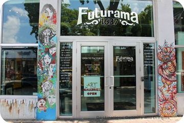 Miami apartment for rent - the front of a restaurant with graffiti on the doors