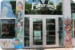Miami apartment for rent - the front of a restaurant with graffiti on the doors
