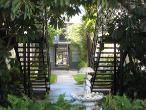 Valley Village apartment for rent - a courtyard with a fountain and a house in the background