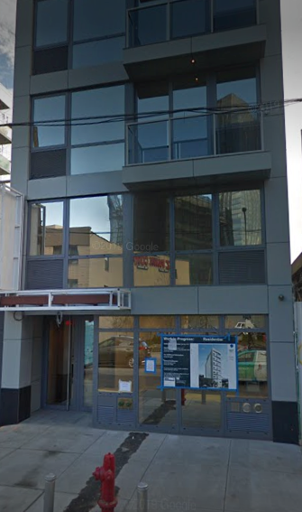Long Island City apartment for rent - the front of a building with a fire hydrant in front of it