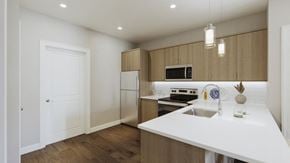 Uniondale apartment for rent - a kitchen with a white counter top and a sink