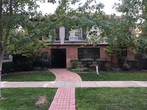 Lodi apartment for rent - a brick house with a sidewalk in front of it