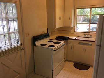Lodi apartment for rent - a small kitchen with a stove and a sink