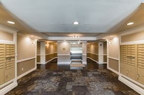 Philadelphia apartment for rent - a locker room with lockers and cabinets and lights on the ceiling