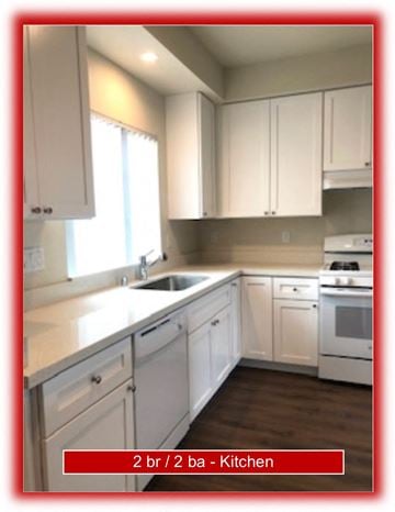 Gilroy apartment for rent - an empty kitchen with white cabinets and a sink