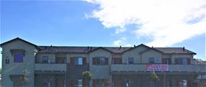 Gilroy apartment for rent - the roof of an apartment building with a sign for renting apartments