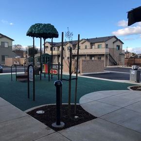 Gilroy apartment for rent - a playground with a swing set in a park