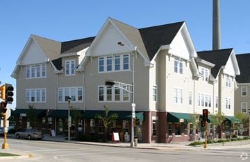 Port Washington apartment for rent - a large apartment building on the corner of a city street