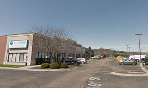Kansas City apartment for rent - A parking lot in front of a Blue Pearl dental office.