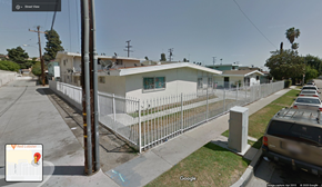 Inglewood apartment for rent - A street view of a residential area with a house and parked cars.