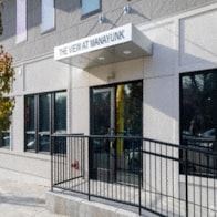 Philadelphia apartment for rent - the front of a white building with a black fence