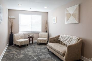 Philadelphia apartment for rent - a living room with a couch and two chairs