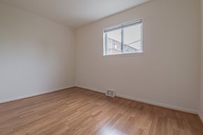 Philadelphia apartment for rent - an empty room with wood floors and a window