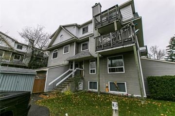 Ottawa house for rent - a house with a balcony on the side of it