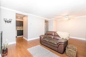 Ottawa house for rent - a living room with a leather couch and a rug