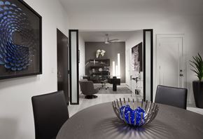 Chamblee apartment for rent - A modern dining room with a large table and chairs.