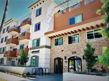 Hollywood apartment for rent - the facade of a building with an archway in front of it