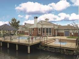 Springfield apartment for rent - A house with a pool and a deck over water.