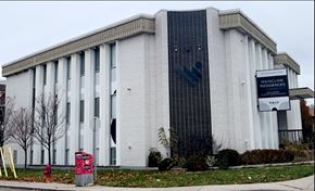 Hamilton apartment for rent - the building is shown from the side of the street