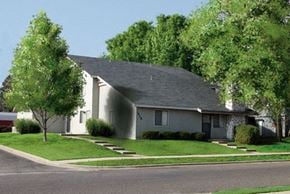 Springfield apartment for rent - a white house with a gray roof on a street
