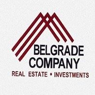 Omaha apartment for rent - the logo for the company real estate investments