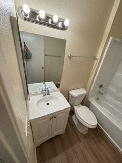 Imperial Beach apartment for rent - A small bathroom with a toilet, sink, and mirror.