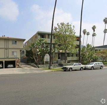 Los Angeles apartment for rent - two cars parked in front of a building on a street