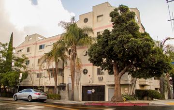 Los Angeles apartment for rent - an apartment building with a car parked in front of it