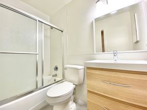 Los Angeles apartment for rent - a bathroom with a toilet and a sink and a shower