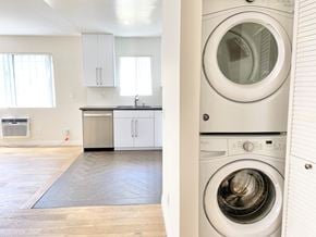 Los Angeles apartment for rent - a washer and dryer in a laundry room next to a kitchen