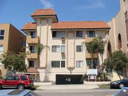 Los Angeles apartment for rent - a building with a red truck parked in front of it