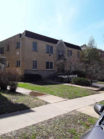 Clayton apartment for rent - a brick building with a sidewalk in front of it