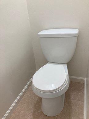 San Diego apartment for rent - a white toilet in a bathroom with white walls