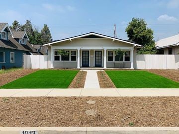Azusa apartment for rent - a house with a lawn and a sidewalk in front of it