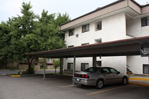 Spokane apartment for rent - a car parked in front of a building