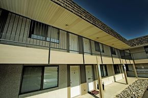 Spokane apartment for rent - a large building with glass doors and windows