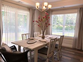 Pembroke apartment for rent - a dining room with a table and chairs