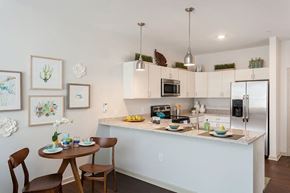 Fairport apartment for rent - a kitchen and dining area with a counter top