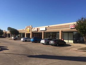 Mesquite apartment for rent - A Dollar General store is shown with a parking lot in front.