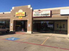 Mesquite apartment for rent - A car dealership with a Texas Car & Payday Loan advertisement.