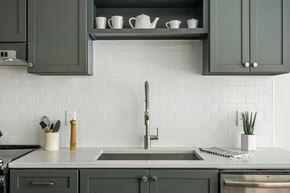 Cleveland apartment for rent - Quarter kitchens feature shaker-style cabinets and ceramic backplash