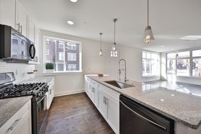Philadelphia apartment for rent - a large kitchen with granite counter tops and stainless steel appliances