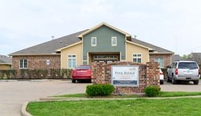 Crockett apartment for rent - a house with a sign that says pine ridge