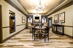 Crockett apartment for rent - A dining room with a table set for six.