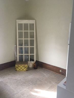 Kitchener apartment for rent - a room with a chair and a window in it
