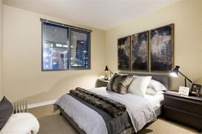 Los Angeles apartment for rent - primary bedroom with large bed at Wilshire Vermont, Los Angeles, CA