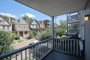 Pittsburgh apartment for rent - A balcony overlooks a residential street.