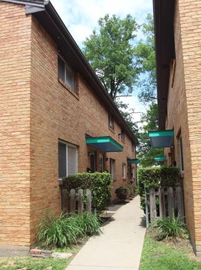 Pittsburgh apartment for rent - a sidewalk in front of a brick building