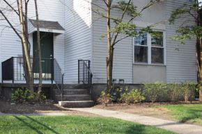 Pittsburgh apartment for rent - the front of a house with steps and a sidewalk